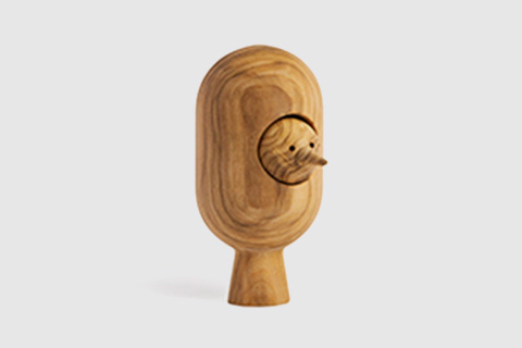 Wooden toy and desk objects with a woodpecker spin top