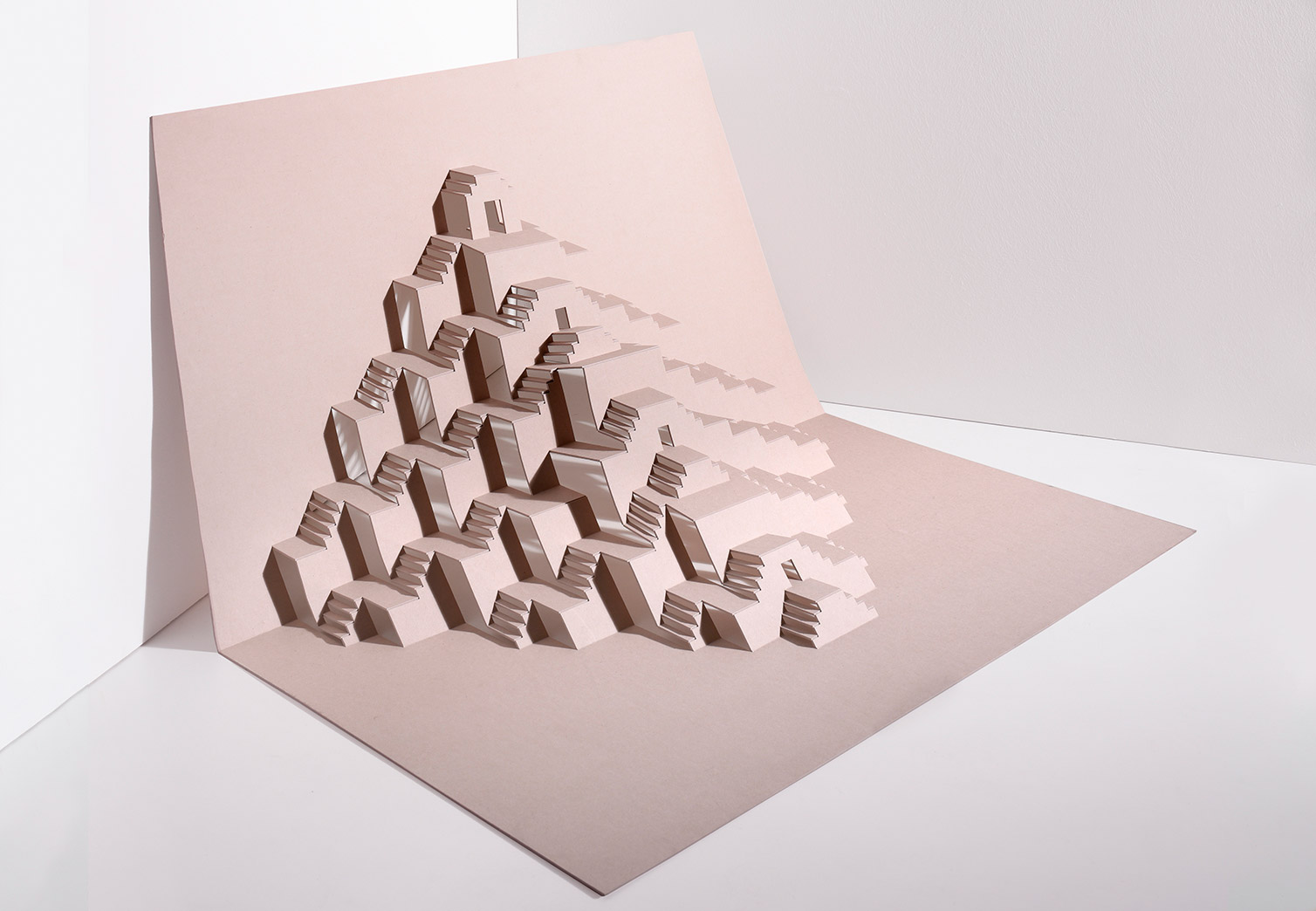 Playing with the most precise cutting machines creating pop up  architectures from a flat surface